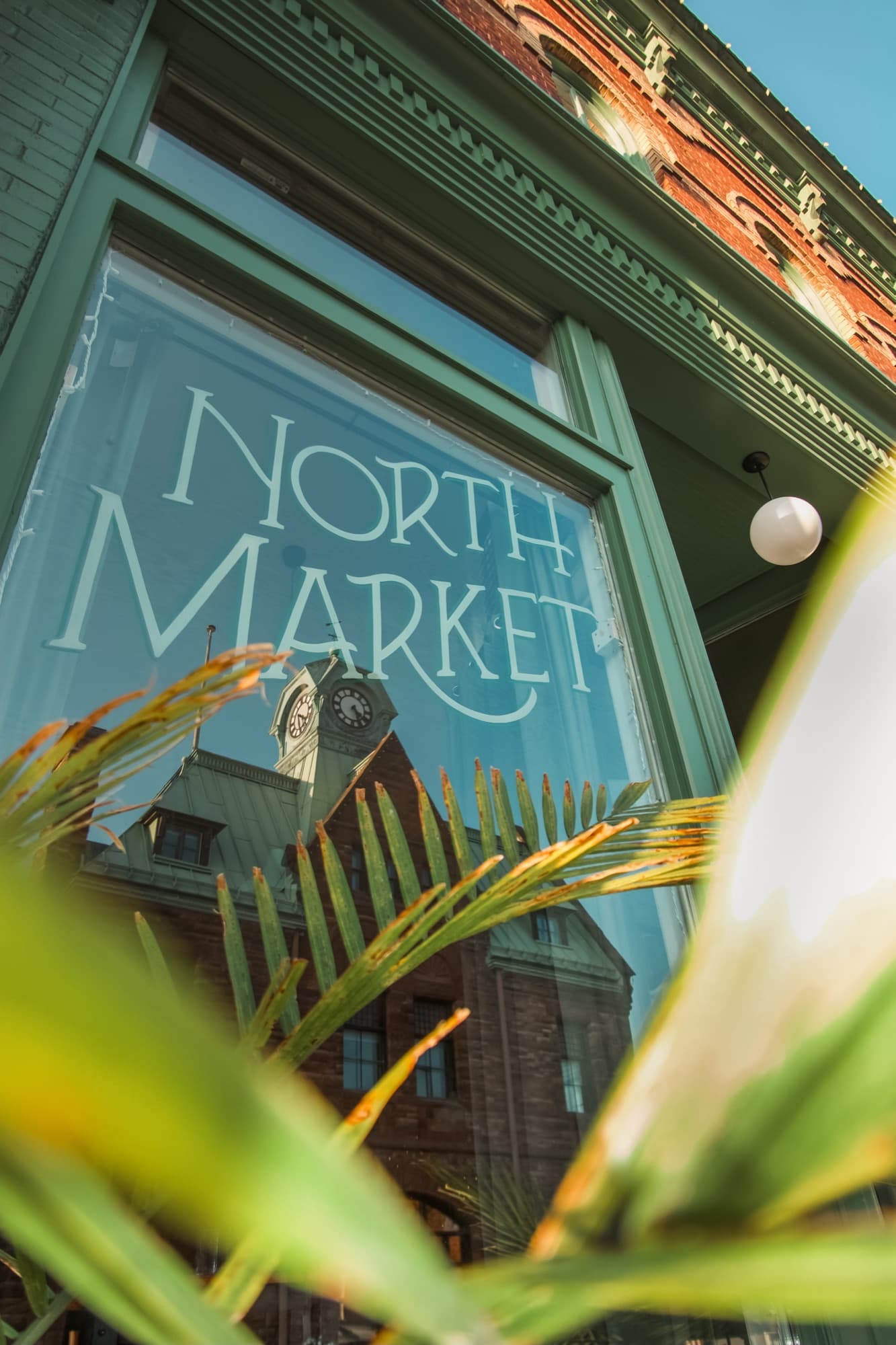 North Market, with the town hall clock tower reflected