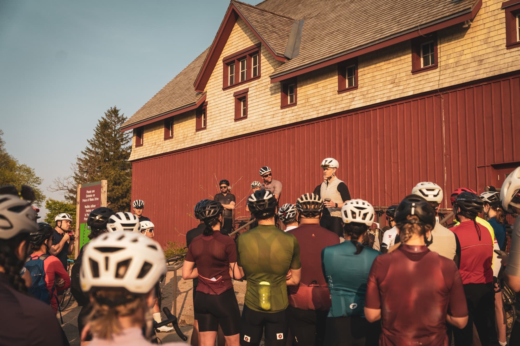 The briefing outside the barn at golden hour