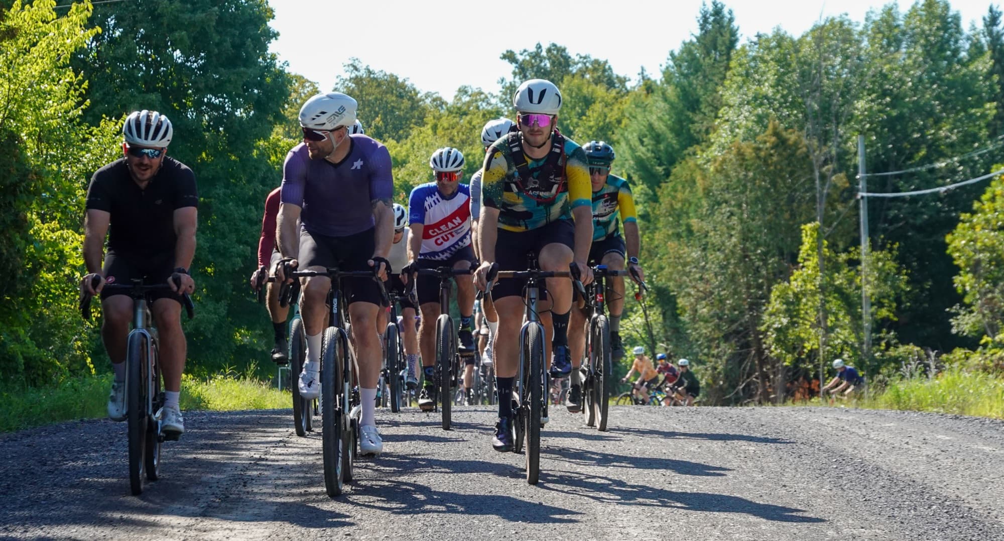 The peloton fills the road