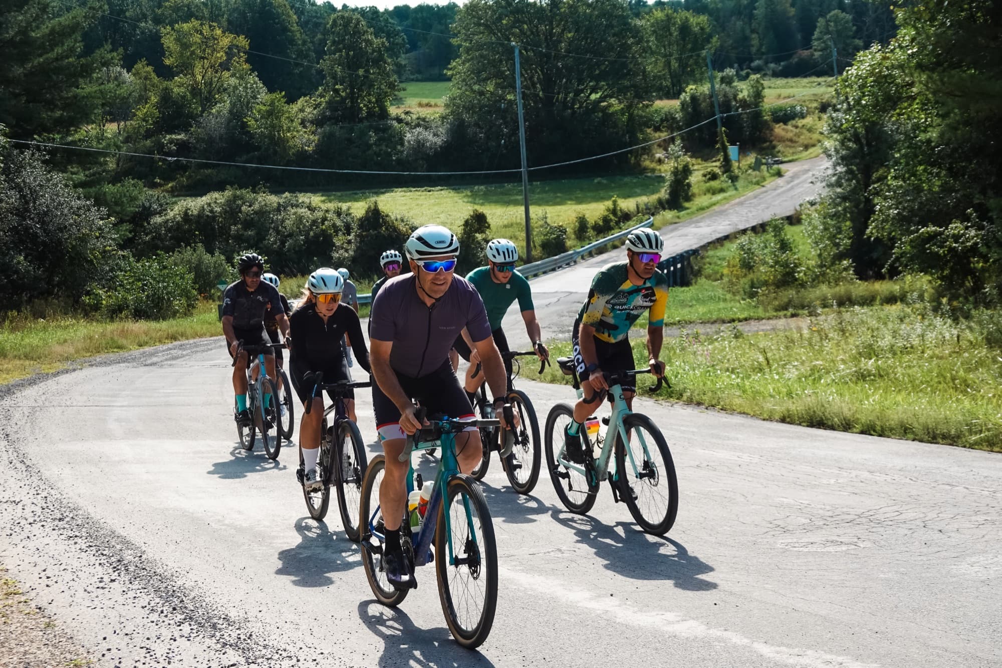 A group rounding a bend above a Lanark County valley